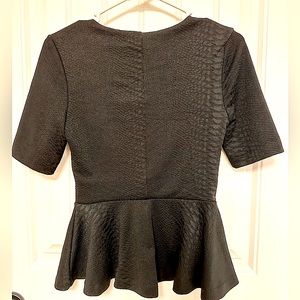 Black peplum top by H&M